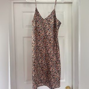 White slip dress with pink, tan and black flowers